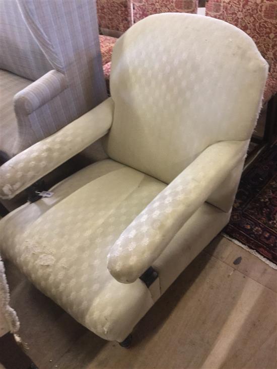 A Victorian open armchair,